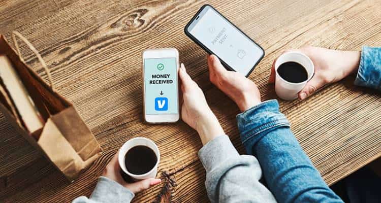 Two individuals engaging in a Venmo transaction, demonstrating ‘How Can I Send Money to Venmo’.